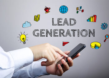 Lead Generation business concept with businessman touching the smartphone.